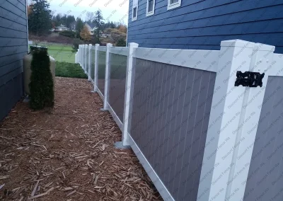 Residential two-toned vinyl fence