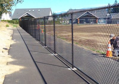 6 foot tall, black chain-link fence at middle school